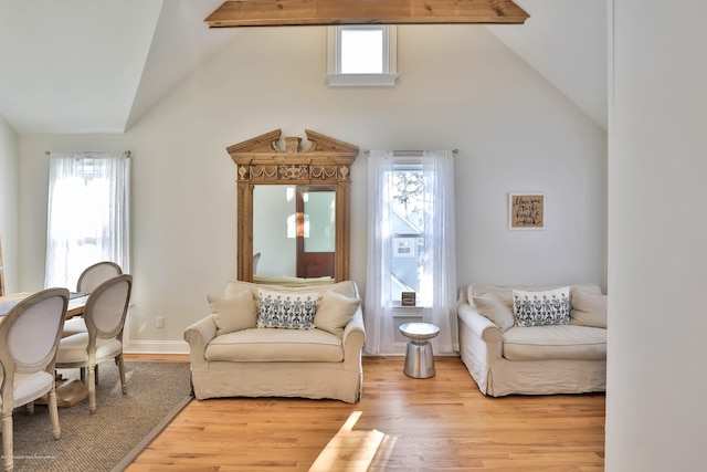 142 Heck Ave, Ocean Grove, NJ 07756 - living area with high vaulted ceiling, wood finished floors, plenty of natural light, beam ceiling, and baseboards