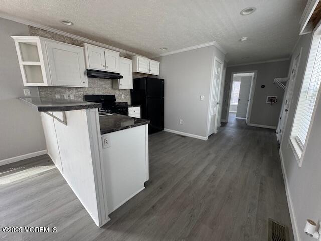 12 Mary Ann Ct, Hazlet, NJ 07734 - kitchen featuring freestanding refrigerator, under cabinet range hood, open shelves, stove, and white cabinetry