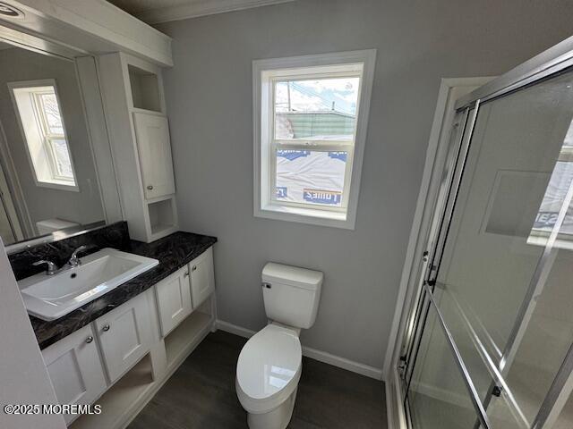12 Mary Ann Ct, Hazlet, NJ 07734 - full bathroom featuring vanity, toilet, a shower stall, and plenty of natural light