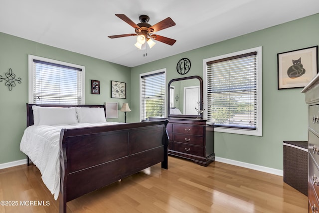 7 Juniper Ln, Jackson, NJ 08527 - bedroom featuring multiple windows, light wood-style flooring, baseboards, and ceiling fan