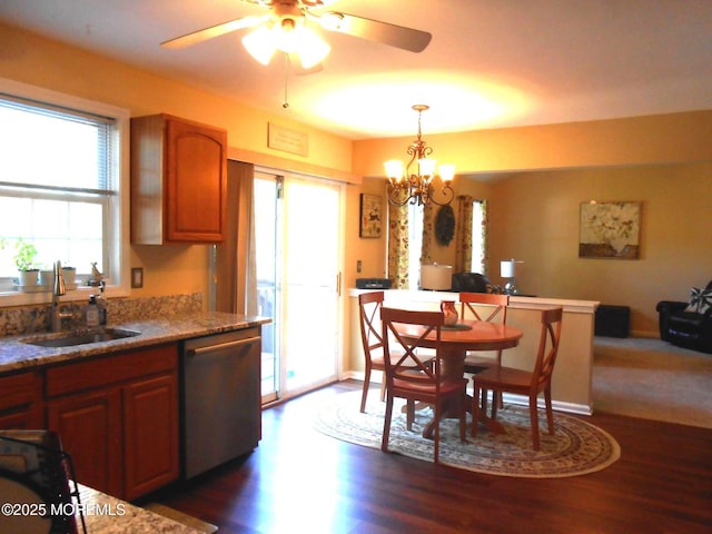 483 Coral Ln, Manahawkin, NJ 08050 - kitchen with stainless steel dishwasher, dark wood-type flooring, hanging light fixtures, a chandelier, and ceiling fan