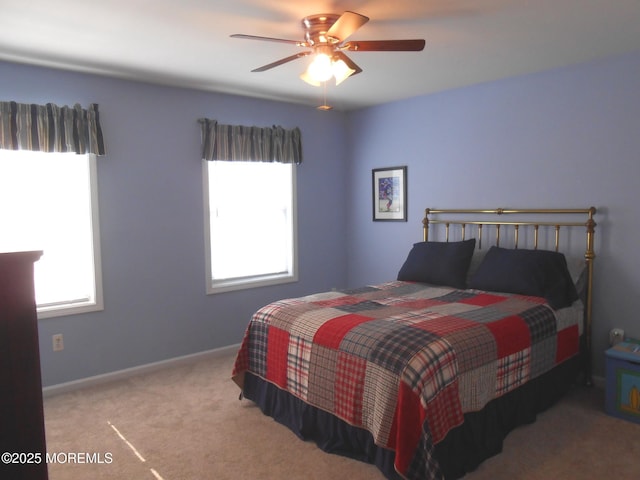 483 Coral Ln, Manahawkin, NJ 08050 - bedroom with multiple windows, carpet floors, and ceiling fan