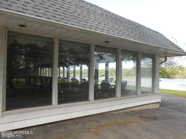 483 Coral Ln, Manahawkin, NJ 08050 - deck featuring a sunroom and a water view
