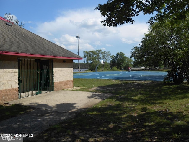 483 Coral Ln, Manahawkin, NJ 08050 - view of green lawn with community basketball court