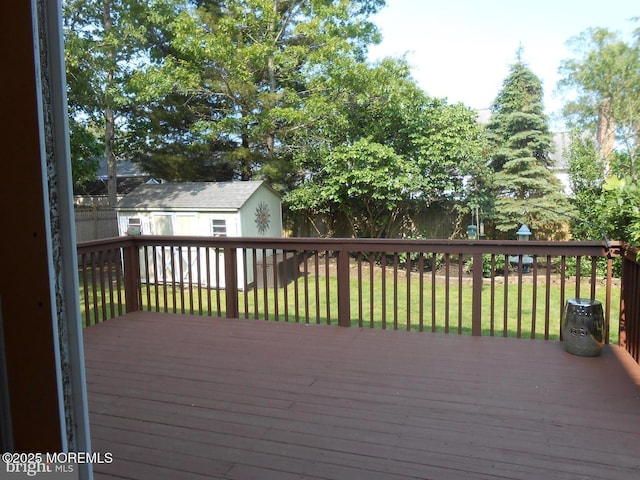 483 Coral Ln, Manahawkin, NJ 08050 - deck with a storage shed and a fenced backyard