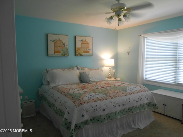 483 Coral Ln, Manahawkin, NJ 08050 - carpeted bedroom with multiple windows and ceiling fan