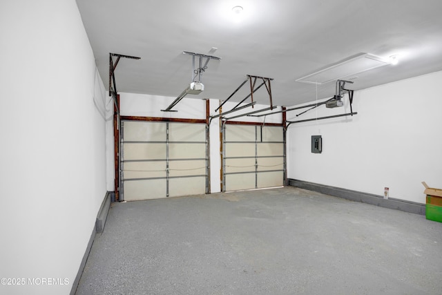 1172 Concord Dr, Brick, NJ 08724 - garage featuring electric panel, a garage door opener, and baseboards