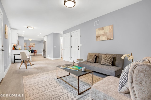 1172 Concord Dr, Brick, NJ 08724 - living area with baseboards