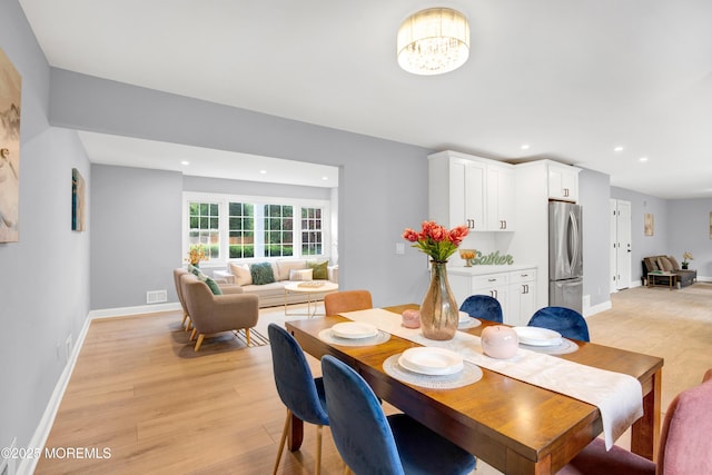 1172 Concord Dr, Brick, NJ 08724 - dining space featuring light wood finished floors, recessed lighting, baseboards, and a chandelier