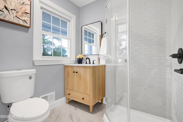 1172 Concord Dr, Brick, NJ 08724 - bathroom with toilet, vanity, a shower stall, marble finish floors, and baseboards
