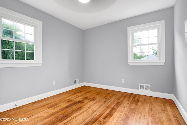 1172 Concord Dr, Brick, NJ 08724 - spare room with baseboards and hardwood / wood-style flooring