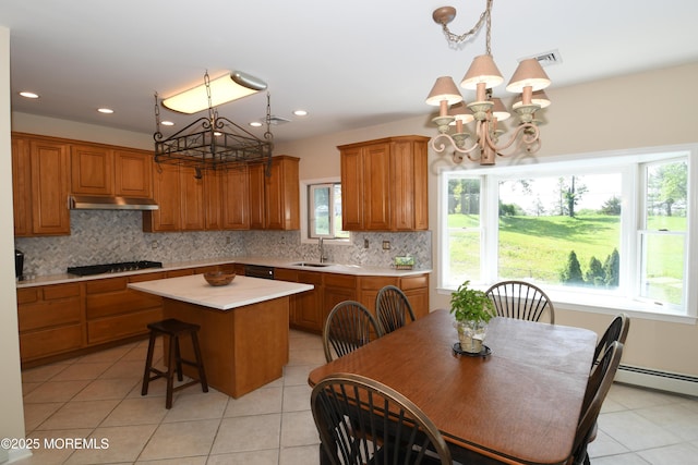 6 Marc Ln, North Hanover, NJ 08562 - kitchen with a chandelier, under cabinet range hood, a sink, gas stovetop, and recessed lighting