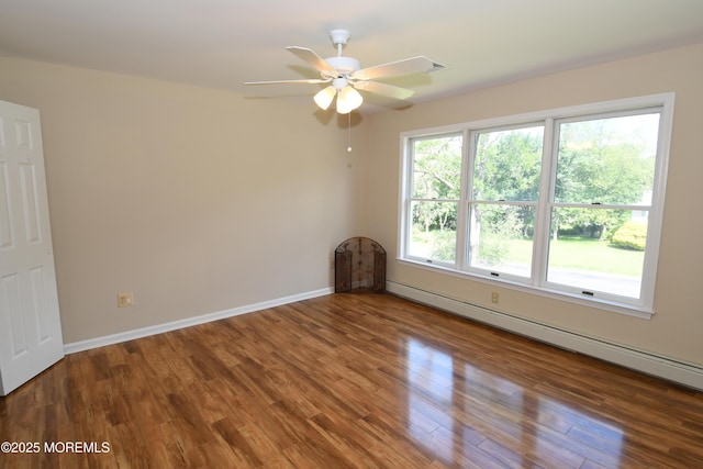 6 Marc Ln, North Hanover, NJ 08562 - empty room featuring baseboard heating, wood finished floors, a ceiling fan, and baseboards