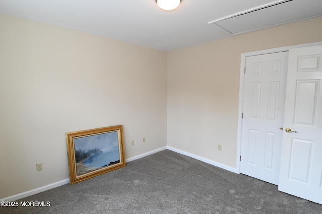 6 Marc Ln, North Hanover, NJ 08562 - unfurnished room with dark carpet, baseboards, and attic access