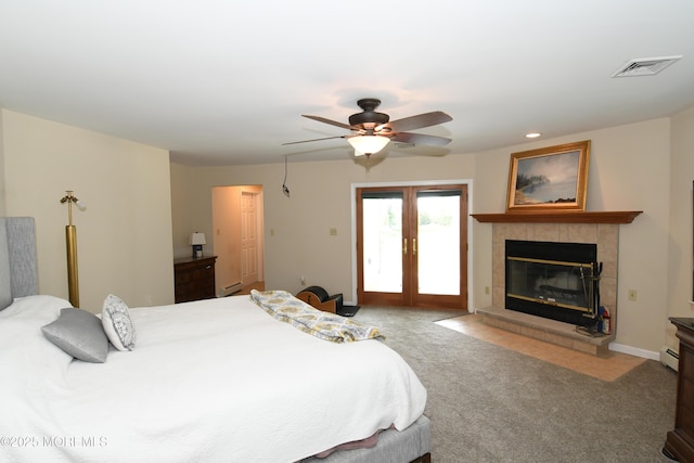 6 Marc Ln, North Hanover, NJ 08562 - bedroom with access to outside, carpet floors, a fireplace, a baseboard radiator, and ceiling fan