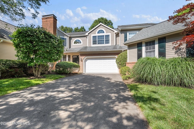 34 Peach Tree Ln, Little Silver, NJ 07739 - view of front facade featuring driveway, brick siding, an attached garage, a chimney, and roof with shingles