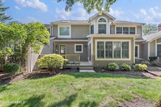 34 Peach Tree Ln, Little Silver, NJ 07739 - view of front of property featuring a front lawn and a deck