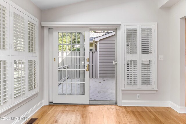 34 Peach Tree Ln, Little Silver, NJ 07739 - doorway featuring wood finished floors and baseboards