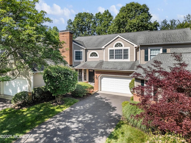 34 Peach Tree Ln, Little Silver, NJ 07739 - view of front facade featuring driveway, a chimney, a garage, a shingled roof, and brick siding