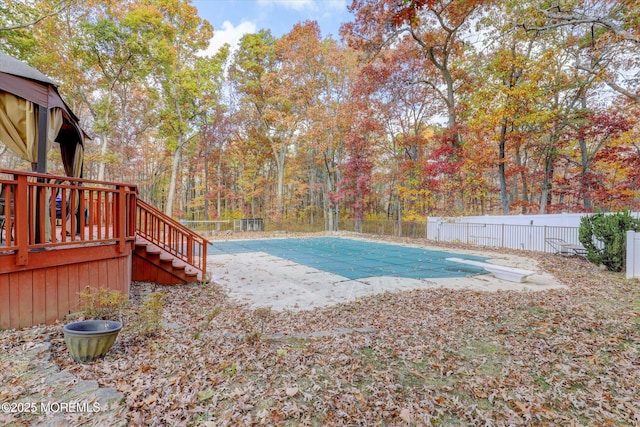 9 Rutherford Ct, Jackson, NJ 08527 - view of pool with a diving board, stairway, and a wooden deck