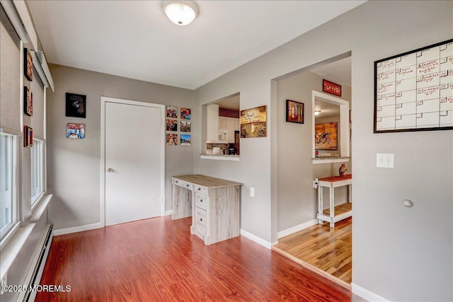 1936 Yorktowne Blvd, Toms River, NJ 08753 - office area with a baseboard heating unit, wood finished floors, and baseboards