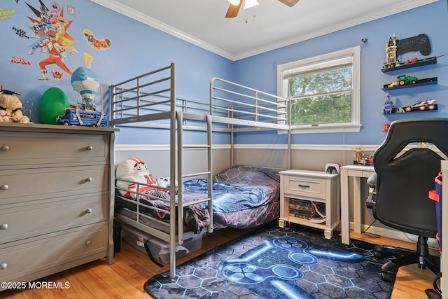 9 W Susan St, Hazlet, NJ 07730 - bedroom with wood finished floors, crown molding, a wainscoted wall, and ceiling fan