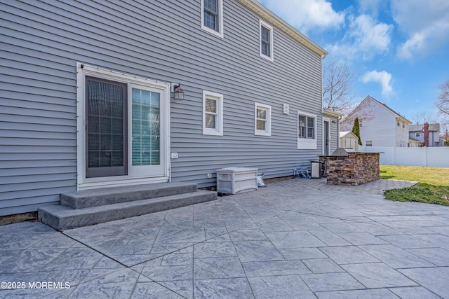 6 Kenneth Dr, Ocean Twp, NJ 07712 - rear view of property featuring a patio area and an outdoor kitchen