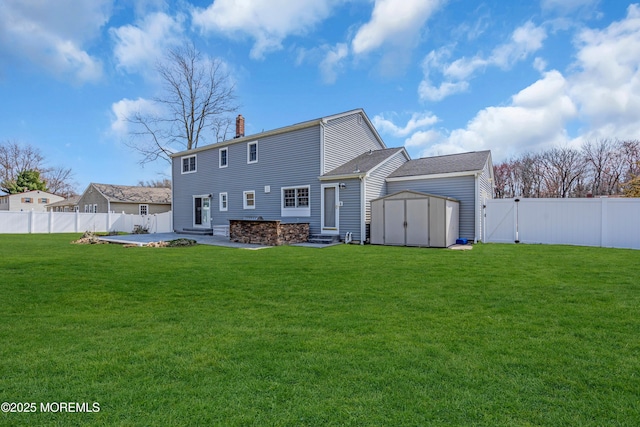6 Kenneth Dr, Ocean Twp, NJ 07712 - rear view of property with a chimney, a gate, a patio area, and entry steps