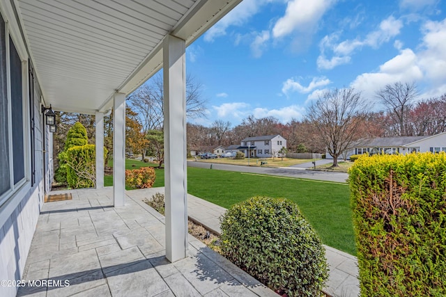 6 Kenneth Dr, Ocean Twp, NJ 07712 - covered porch with a lawn and a residential view