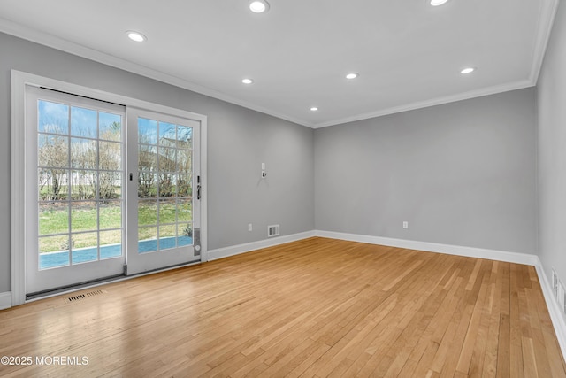 6 Kenneth Dr, Ocean Twp, NJ 07712 - spare room with plenty of natural light, crown molding, baseboards, light wood-style flooring, and recessed lighting