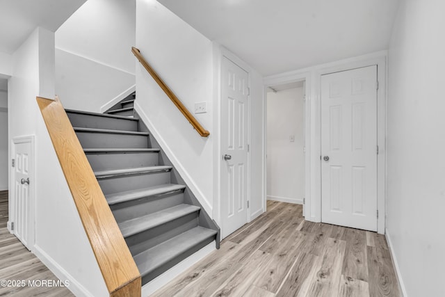 6 Kenneth Dr, Ocean Twp, NJ 07712 - stairs featuring wood finished floors and baseboards