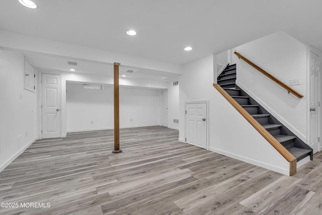 6 Kenneth Dr, Ocean Twp, NJ 07712 - finished basement featuring stairs, wood finished floors, recessed lighting, and baseboards