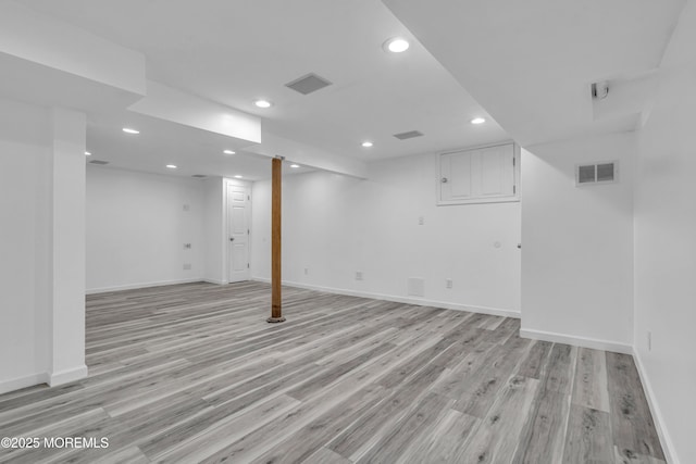 6 Kenneth Dr, Ocean Twp, NJ 07712 - finished below grade area with recessed lighting, light wood finished floors, and baseboards