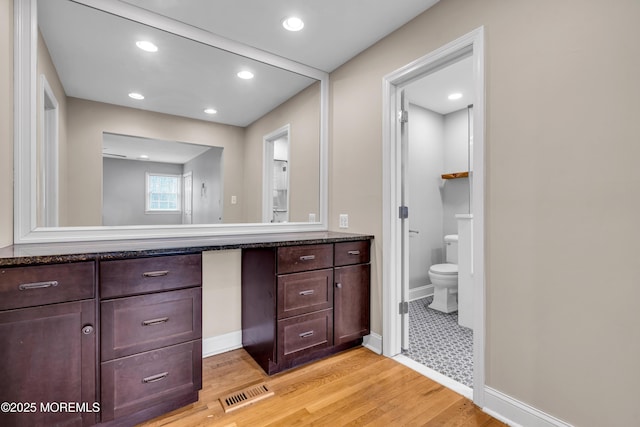 6 Kenneth Dr, Ocean Twp, NJ 07712 - full bathroom featuring vanity, toilet, wood finished floors, recessed lighting, and baseboards