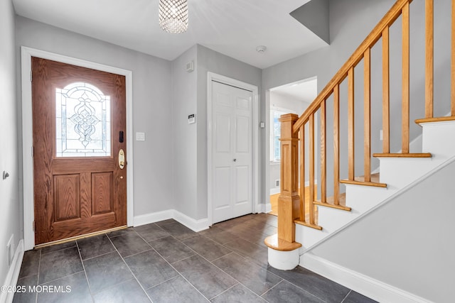 6 Kenneth Dr, Ocean Twp, NJ 07712 - foyer entrance featuring stairs and baseboards