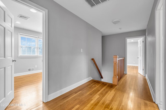 6 Kenneth Dr, Ocean Twp, NJ 07712 - hall with an upstairs landing, light wood finished floors, baseboards, and recessed lighting