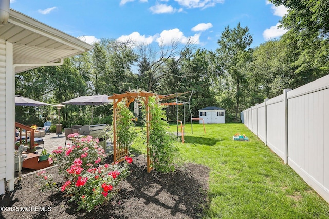 67 Koenig Ln, Freehold, NJ 07728 - view of yard featuring a patio and view of wooded area