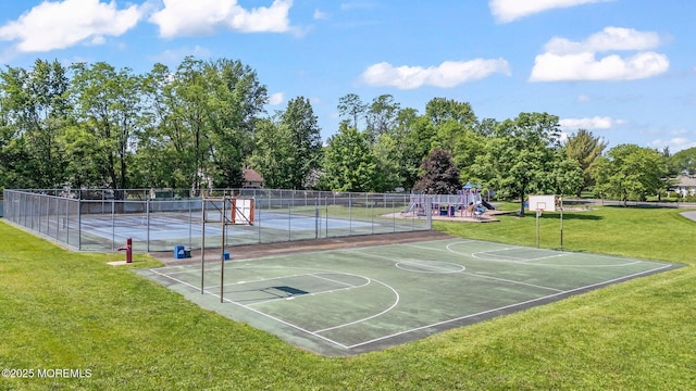 67 Koenig Ln, Freehold, NJ 07728 - view of sport court featuring community basketball court, a tennis court, and view of wooded area