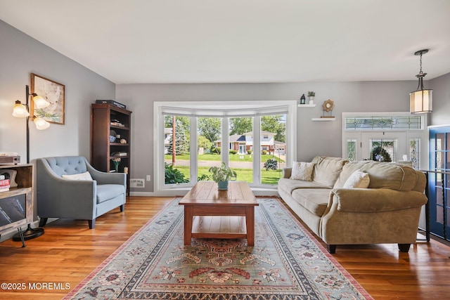 67 Koenig Ln, Freehold, NJ 07728 - living room with wood finished floors
