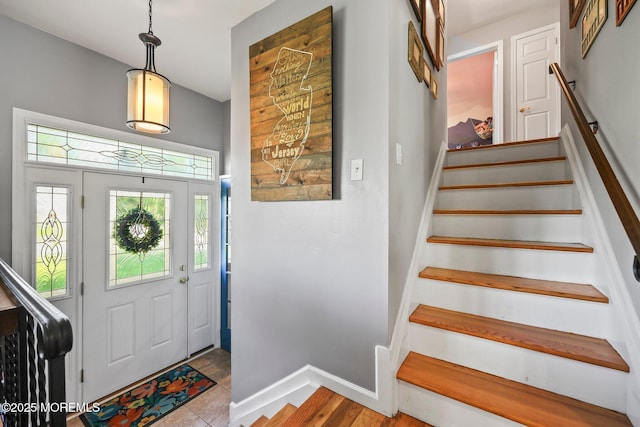 67 Koenig Ln, Freehold, NJ 07728 - foyer entrance featuring stairs and baseboards