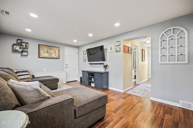 67 Koenig Ln, Freehold, NJ 07728 - living area featuring wood finished floors, recessed lighting, and baseboards
