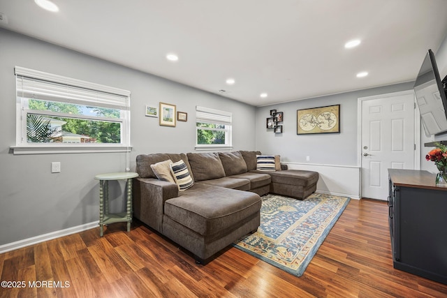 67 Koenig Ln, Freehold, NJ 07728 - living room with dark wood-type flooring, recessed lighting, and baseboards