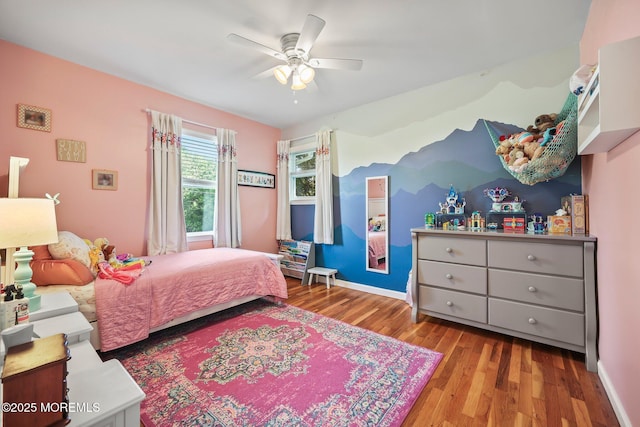 67 Koenig Ln, Freehold, NJ 07728 - bedroom featuring wood finished floors, ceiling fan, and baseboards