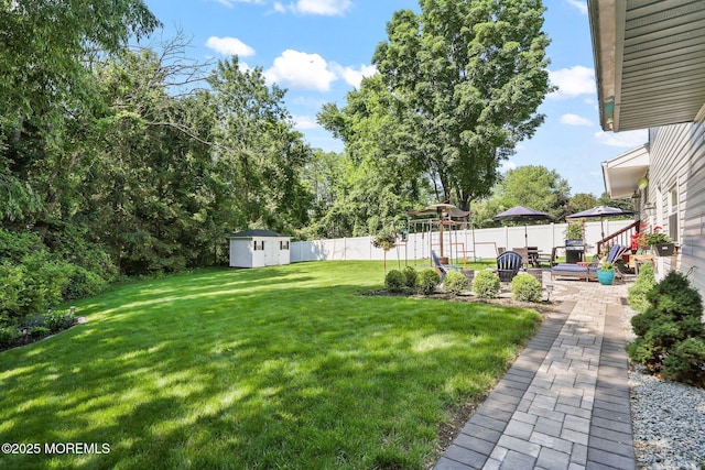 67 Koenig Ln, Freehold, NJ 07728 - view of yard with a patio
