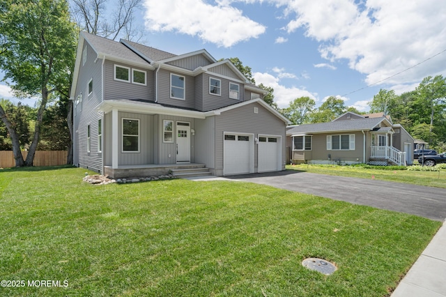783 Delaware Ave, Manahawkin, NJ 08050 - view of front facade featuring board and batten siding, driveway, and an attached garage