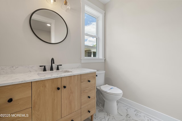 783 Delaware Ave, Manahawkin, NJ 08050 - bathroom featuring marble look tiles, baseboards, vanity, and toilet