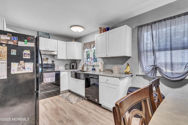 235 Columbine Ave Unit A, Whiting, NJ 08759 - kitchen featuring black appliances, a sink, under cabinet range hood, light wood-style floors, and white cabinets