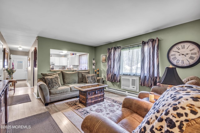 235 Columbine Ave Unit A, Whiting, NJ 08759 - living area featuring baseboard heating, light wood-style flooring, and cooling unit