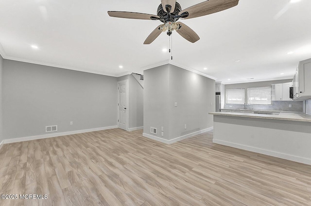 112 Azalea Cir, Jackson, NJ 08527 - unfurnished living room featuring ornamental molding, light wood-style flooring, a ceiling fan, baseboards, and recessed lighting