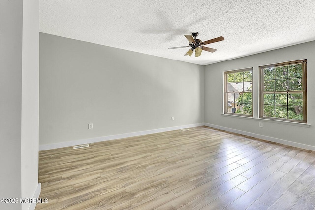 112 Azalea Cir, Jackson, NJ 08527 - empty room with a textured ceiling, ceiling fan, light wood-style floors, and baseboards